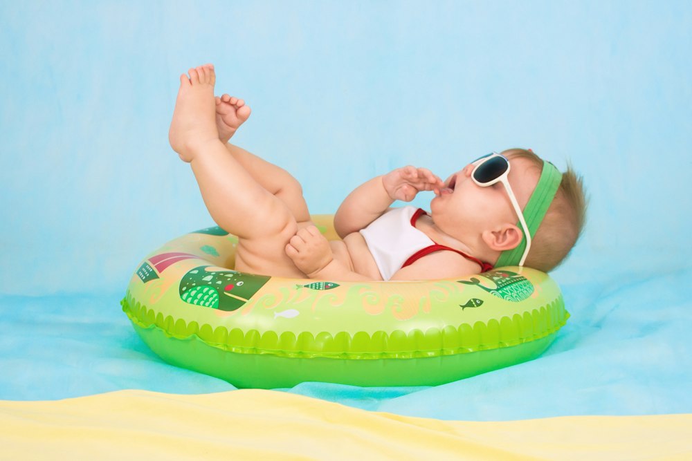 Baby relaxing in a swim ring