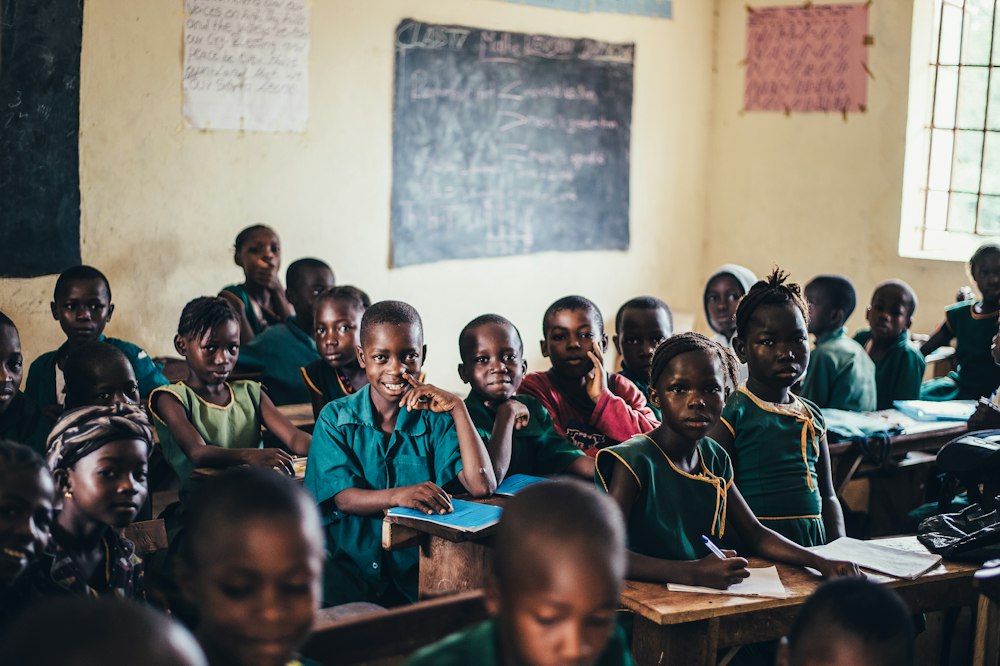 Young students smiling in their classroom